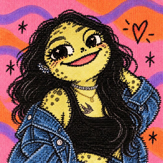 A colorful, embroidered-style illustration of a yellow-skinned girl with freckles, dark hair, and a denim jacket, with a small heart and sparkle details around her.