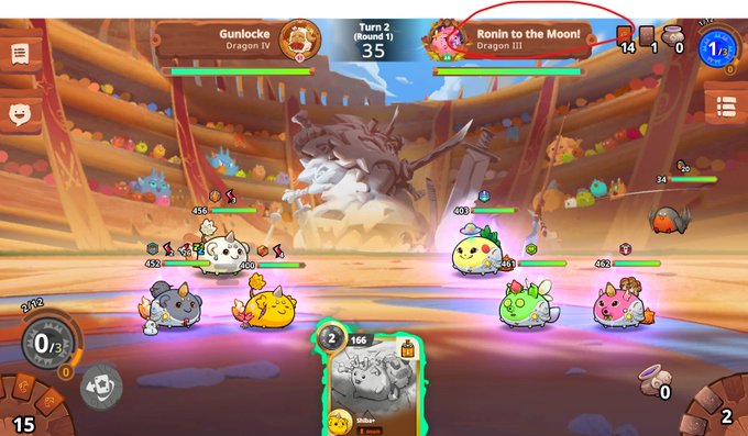 A screenshot of the mobile game Axie Infinity showing a battle arena between teams 'Gunlocke' and 'Ronin to the Moon!' during Turn 2, Round 1.