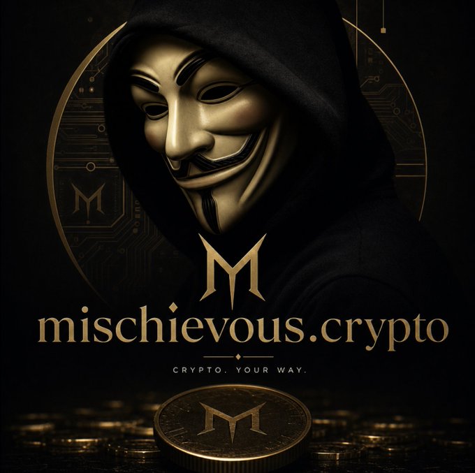 A promotional graphic for 'mischievous.crypto' featuring a hooded figure wearing a Guy Fawkes mask, a gold 'M' logo, and a physical coin.