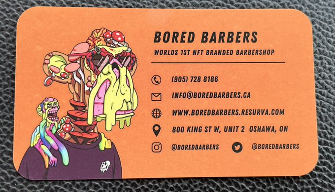 An orange business card for 'BORED BARBERS,' the 'WORLDS 1ST NFT BRANDED BARBERSHOP,' featuring phone number (905) 728 8186, email info@boredbarbers.ca, website www.boredbarbers.resurva.com, address 800 King St W, Unit 2 Oshawa, ON, and social handles @boredbarbers, illustrated with a grotesque melting cartoon head.