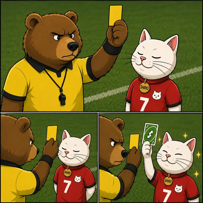 A referee bear gives a yellow card to a cat wearing a "Shiro" jersey with the number 7, who then plays a reverse UNO card. This comic visually represents the sentiment that the bear market is receiving a "reverse" card, hinting at a shift towards a "Cat Market."