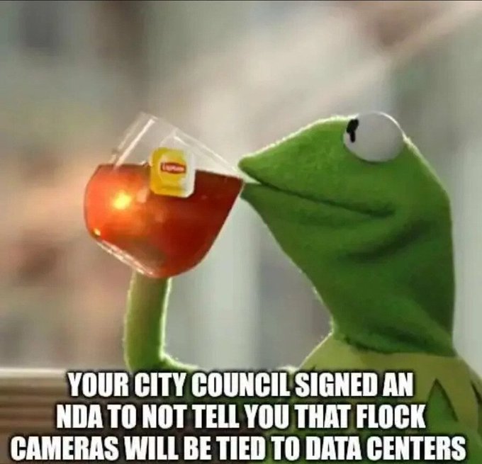 Kermit the Frog holds a glass of Lipton tea with the caption reading: "YOUR CITY COUNCIL SIGNED AN NDA TO NOT TELL YOU THAT FLOW CAMERAS WILL BE TIED TO DATA CENTERS."