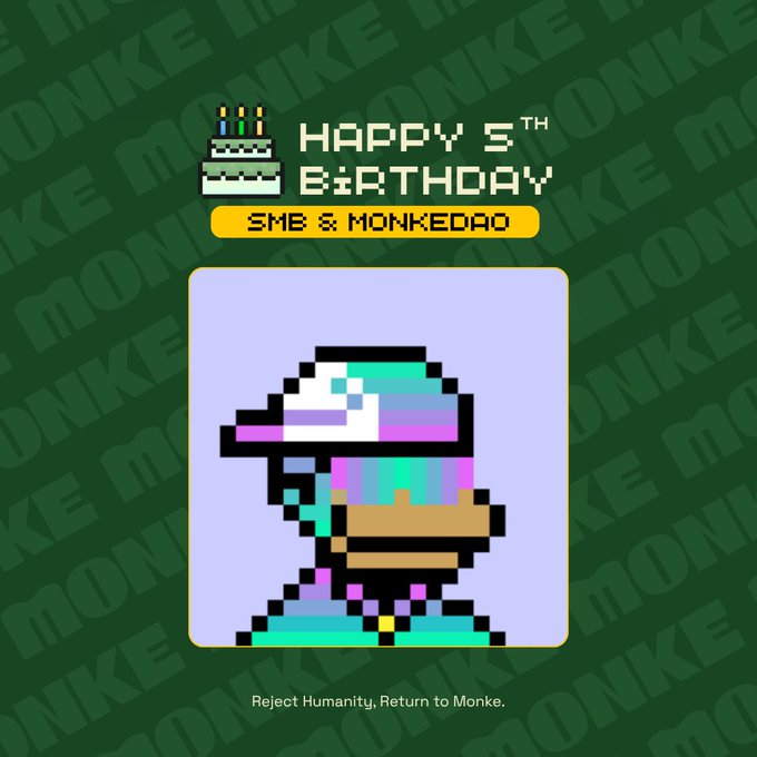 A pixel-art graphic featuring a futuristic, visor-wearing character with a birthday cake icon displays "HAPPY 5TH BIRTHDAY SMB & MONKEDAO," set against a green "MONKE" patterned background with the tagline "Reject Humanity, Return to Monke." This anniversary announcement marks the start of MonkeDAO and Solana Monkey Business (SMB) celebrating five years together, tying into the celebratory activities mentioned in the post.