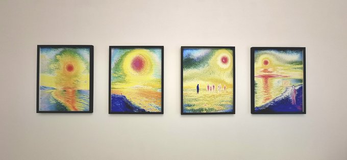 Four framed impressionist-style paintings featuring vibrant sunsets, seas, and figures are hung in a row on a white wall.