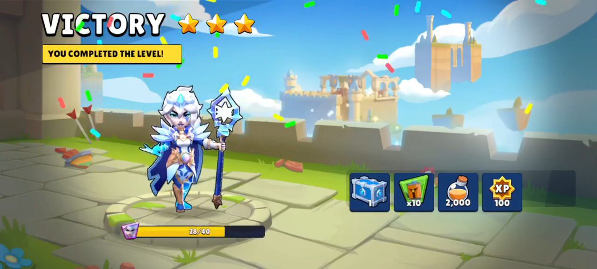 Video game victory screen showing "VICTORY - YOU COMPLETED THE LEVEL!" with three stars, a female ice mage character holding a staff, and rewards including 10 chests, 2,000 potions, and 100 XP.