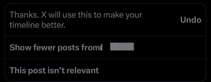 A dark-mode notification from X (formerly Twitter) confirming feedback was received to improve the timeline, offering options to 'Show fewer posts from' a user, mark 'This post isn't relevant', or 'Undo'.