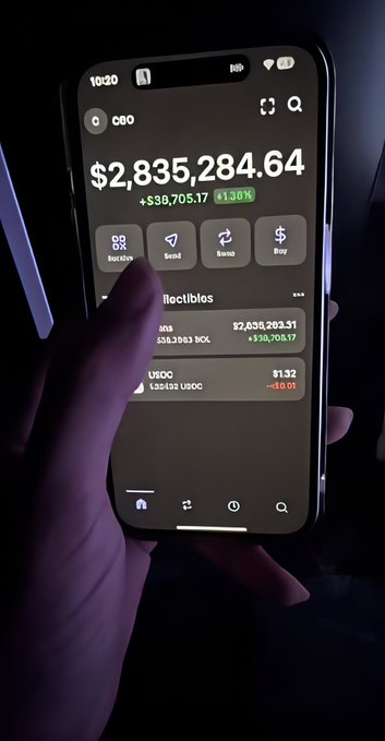 A hand holds a smartphone displaying a crypto portfolio showing a balance of $2,835,284.64 with a +1.38% gain, including USDC holdings of $1.32, while the post teases an airdrop of $SOL by asking for addresses. The image showcases the poster's significant crypto wealth as social proof, likely to attract engagement and build an airdrop recipient list.