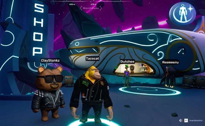 Screenshot from a virtual world showing four avatars with names ClayStonkz, Tacocat, Dutchee, and Reeeeemy standing in a futuristic environment near a 'SHOP' and 'Worldgem' structure.