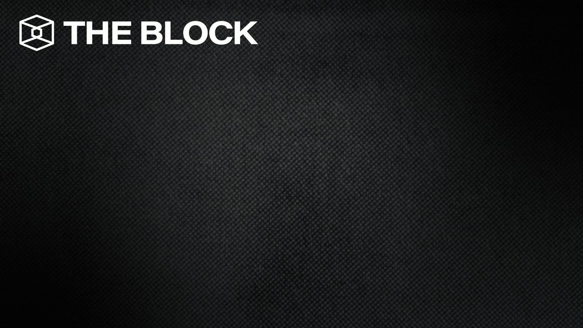 An advertisement for an online trading platform that features a gray background with white text advertising "The Block" and "ICO sold 32 Bitcoins at approximately $2.5 million, reducing its total holdings to 843,706 BTC". The website mentioned is also present in the image.