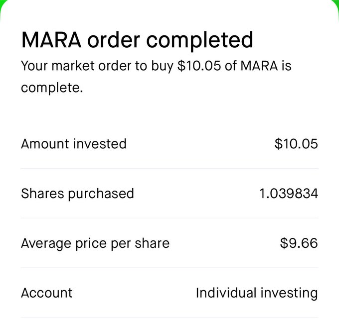 A mobile screenshot of a brokerage notification confirming a completed market order to buy $10.05 of MARA stock at an average price of $9.66 per share (1.039834 shares total), documenting the transaction referenced in the post.