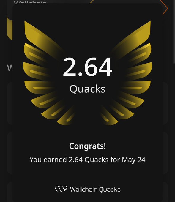 A gold-colored trophy with a black border and the text "Congratulations! You earned 2,664 Quacks for May 24" is displayed on a phone screen.