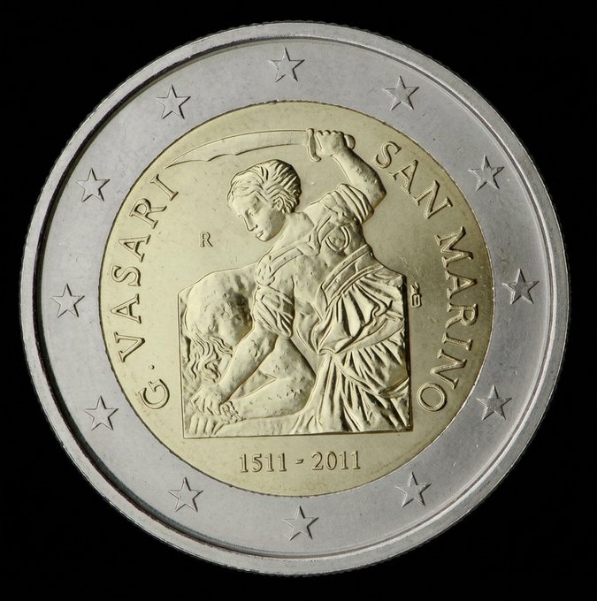 A close-up of a 2 Euro commemorative coin featuring a depiction of Giorgione's painting 'Sleeping Venus' with the text 'G. VASARI', 'SAN MARINO', and the dates '1511 - 2011'.