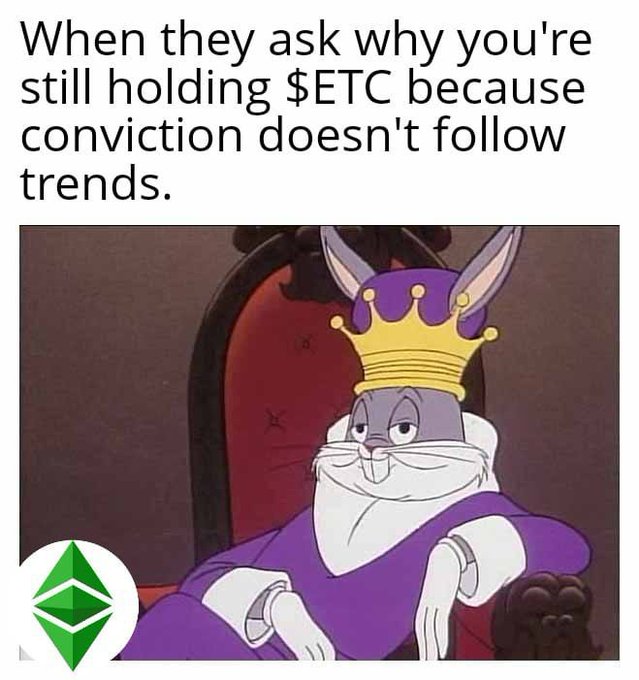 The image features Bugs Bunny wearing a crown and royal purple robe sitting on a throne, with the Ethereum Classic ($ETC) logo in the bottom corner. The caption reads: "When they ask why you're still holding $ETC because conviction doesn't follow trends." This aligns with the post's theme that $ETC remains a long-standing "king" of crypto through conviction and immutability rather than trend-chasing, portraying the holder as royalty who rules based on principle rather than hype.