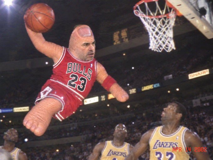 An edited meme image showing a bald man with a headband wearing a Chicago Bulls #23 jersey flying through the air with a basketball, with Los Angeles Lakers players below; 'APR 14 2008' appears in the corner.