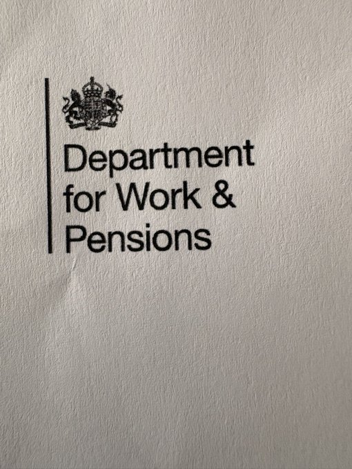A close-up of a document or letterhead displaying the British coat of arms and the text 'Department for Work & Pensions.'