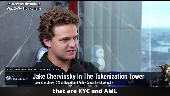 A screenshot from a YouTube video titled "Jake Chervinsky In The Tokenization Tower" showing Jake Chervinsky, CEO of Hyperliquid Policy Center, speaking live from the Empire State Building about KYC and AML regulations. Source: @TheRollup via @WuBlockchain.