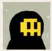 A pixelated icon shows a black hooded figure with a yellow robot-like face design.