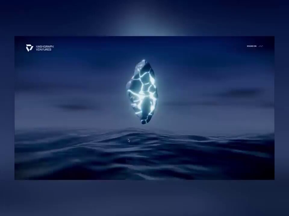 The image features a large, blue diamond shape floating in the center of two dark blue waves. It appears that the diamond is captured mid-flight over the ocean. The scene suggests a creative project or artistic display related to the concept of diamonds and waves. The caption on the post emphasizes this unique aspect of the image, stating "Awesome for @HashgraphVC to win SOTD".