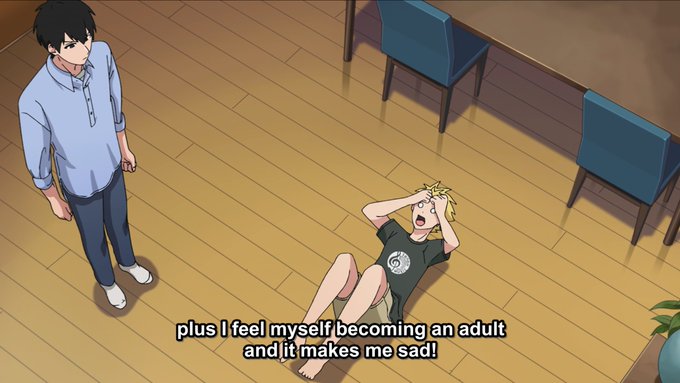 An anime scene with a man in a blue shirt standing and looking down at a blonde girl sitting on the floor holding her head, with a subtitle reading 'plus I feel myself becoming an adult and it makes me sad!'.