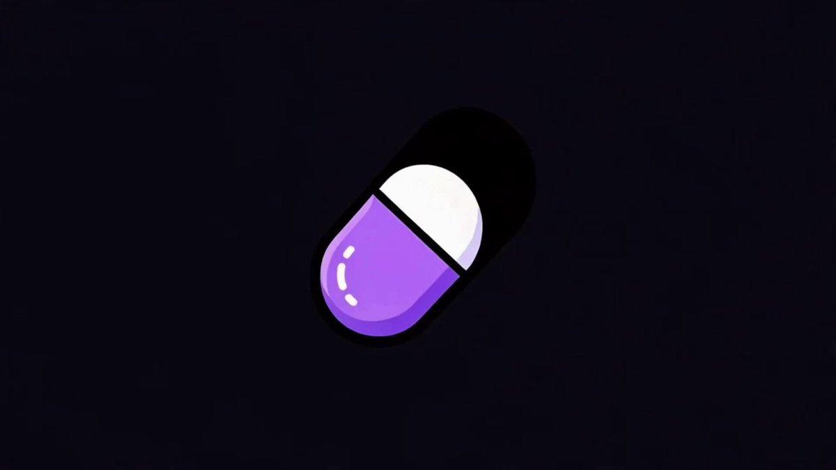 The image features a purple pill with white edges against a black background. The pill has been split into two halves, one being the main part and the other being a smaller piece that appears to be floating or hovering above the main part of the pill. This design choice creates an interesting visual effect and draws attention to the central theme of the image - the purple pill with white edges.