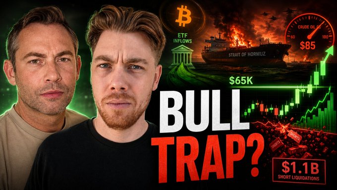 A crypto YouTube thumbnail featuring two men with text 'BULL TRAP?' alongside imagery of an ETF inflows building, the Strait of Hormuz, crude oil at $85, a Bitcoin price of $65K, and $1.1B short liquidations.