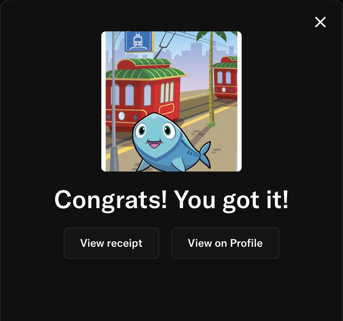 The image is a screenshot from a social media platform, where a picture of a cartoon fish has been shared with some text above it. The caption reads "Congratulations! You got it!", and below it there are two options. One option suggests that users should click on 'view receipt' to see the details of how their friend's post was accepted or shared; another option encourages viewers to click on 'view profile' to view more information about the person who created the picture, like their profile photo, recent posts, and other relevant data. These options provide a way for users to understand what has happened with this social media post in greater detail.