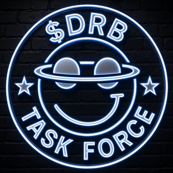 A glowing blue neon sign on a dark brick wall reads '$DRB TASK FORCE' surrounding a smiley face wearing a hat and sunglasses, flanked by two stars.