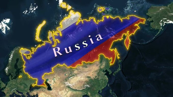 A satellite map of Russia is overlaid with the Russian flag (white, blue, and red) and labeled "Russia" in white text, visually reinforcing the post's point about Russian crypto holders increasingly turning to self-custody through hardware wallets in response to Putin's tightening crypto regulations.