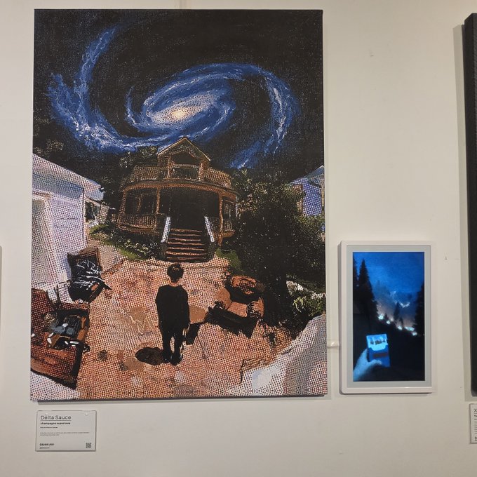 An art gallery display titled 'Datta Sauce' showing a Van Gogh's 'Starry Night'-styled canvas of a house with a swirling galaxy sky, alongside a framed photograph on the wall.