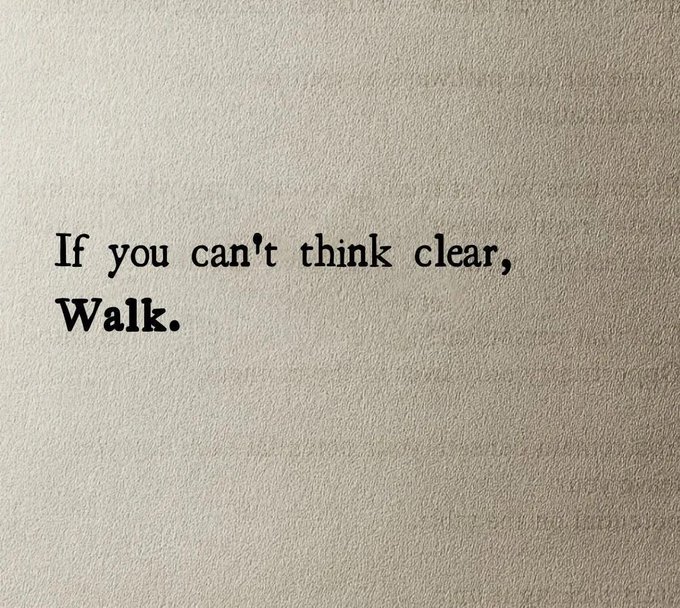 A minimalist typewritten quote on a textured background that reads, 'If you can't think clear, Walk.'