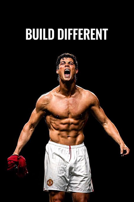 A muscular athlete in white shorts roars triumphantly with arms spread wide, with the text "BUILD DIFFERENT" displayed at the top.