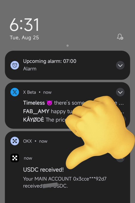 An iPhone lock screen displays the time 6:31, an upcoming alarm at 7:00, X (Twitter) notifications, and a USDC crypto deposit notification, with a thumbs-down emoji overlay.
