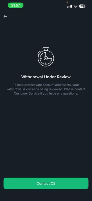 The image shows a Tokocrypto withdrawal screen displaying "Withdrawal Under Review" with a message stating the withdrawal is being reviewed to protect the account and assets, featuring a "Contact CS" button at the bottom. This relates to the user's complaint by illustrating the frustrating experience of having their withdrawal stuck in review on the exchange.