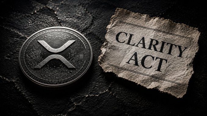 A silver XRP (Ripple) cryptocurrency coin displayed next to a torn piece of paper reading 'CLARITY ACT' on a dark stone surface.