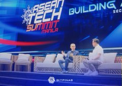 A stage at the ASEAN Tech Summit featuring two men seated in armchairs during a panel discussion, with BITPINAS branding visible at the bottom.