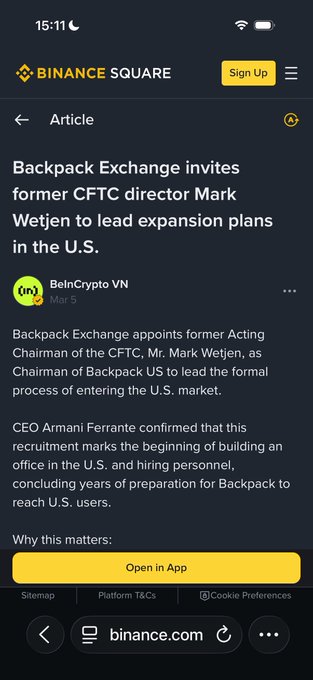 The image features a cell phone screen with text displayed on it about Backpack Exchange. The post highlights that Mark Wetjen, the former acting Chairman of the U.S. Commodity Futures Trading Commission (CFTC), has joined Backpack US and is planning to lead an expansion into the U.S., according to an article posted on their website. The CFTC's plan indicates how they intend to enter the market with a focus on marketing and regulatory rails, making it harder for competitors like Backpack Exchange to challenge them.