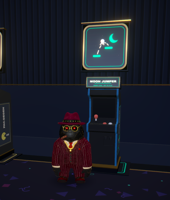 A 3D animated gorilla character wearing a red pinstripe suit, fedora hat, and sunglasses, standing next to an arcade machine labeled 'MOON JUMPER' in a dark arcade setting.