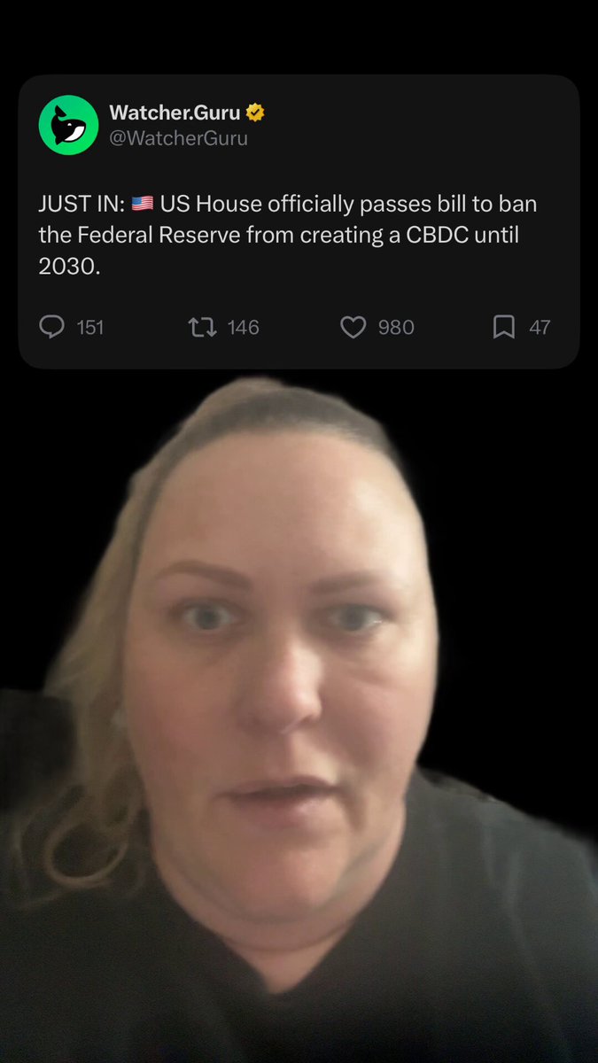 The image shows a woman with blonde hair wearing a black shirt, looking at the camera while typing something into her Twitter account. The caption of the post reads "JUST IN The house pass a bill to ban the Federal Reserve from creating CBDC until 203A Many people in the crypto community view this as A positive development for Bitcoin and decentralized cryptocurrencies". This post seems to be discussing the potential implications of a new law that would ban the creation of a digital currency, specifically CBDC.