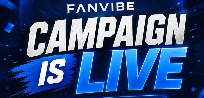 A promotional graphic with bold blue and white text reading 'FANVIBE CAMPAIGN IS LIVE' against a dark dynamic background with light effects.