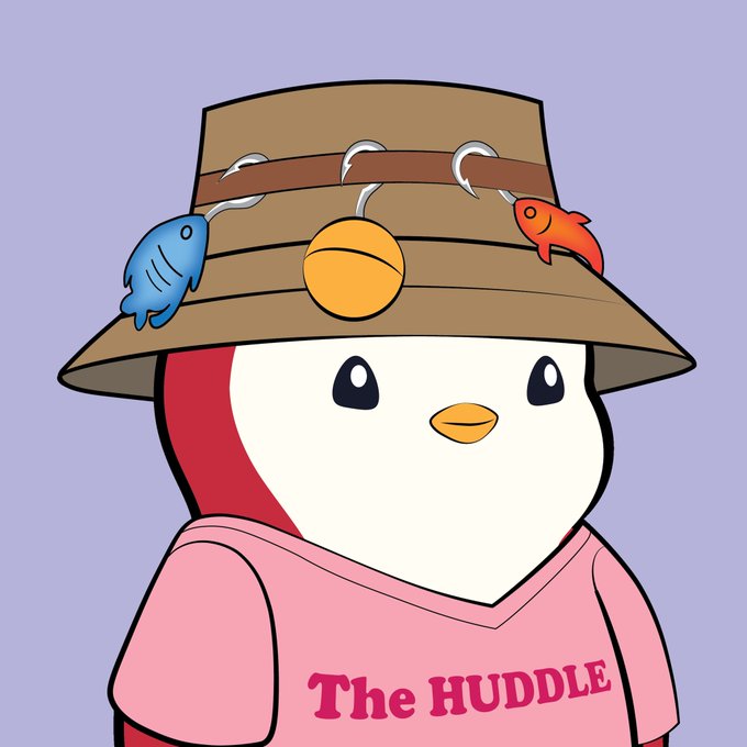 A cartoon penguin wearing a pink shirt that reads "The HUDDLE" and a brown bucket hat decorated with fishing lures and a bell, visually capturing the post's lighthearted wish for fun, friends, and big gains during the bull run.