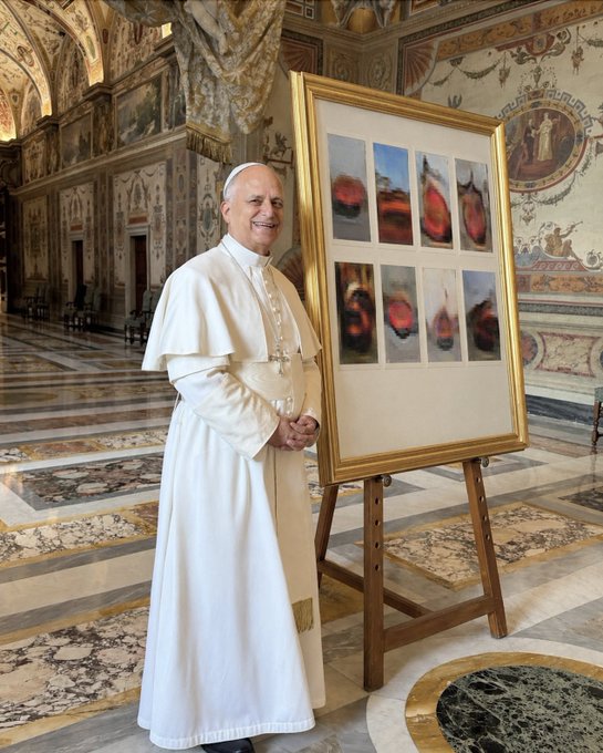 The image shows a smiling man in papal vestments standing beside a framed artwork displayed on an easel in an ornate Vatican hall. The post mocks this as a "psyops" attempt to spread fear, uncertainty, and doubt (FUD) about the contemporary abstract art piece, humorously framing it as manipulation to depress the "price" of the artwork before acquiring it.
