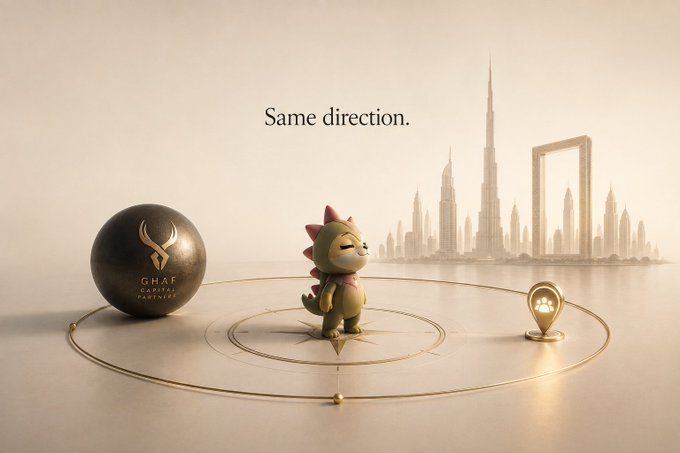 A cartoon dinosaur character stands on a circular emblem between a Ghaf Capital Partners sphere and a Dubai cityscape pin, with the text "Same direction." displayed above. The image visually unites Ghaf Capital and Dubai's landmarks to mirror the post's point that the Sleepagotchi mascot Dino connects with the UAE's blockchain investment community.
