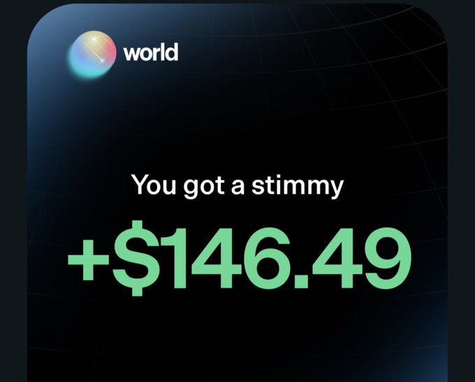 A dark-themed app notification or screen displaying the 'world' logo and the text 'You got a stimmy +$146.49' in large green text.