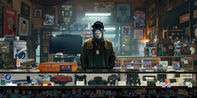 A gorilla wearing sunglasses, a cap, a jacket, and a dollar-sign necklace stands behind the counter of a cluttered collectibles and gaming shop filled with game controllers, figurines, and stickers.