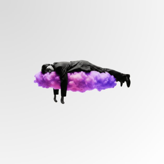A businessman in a suit lies horizontally on a purple cloud against a white background, evoking a surreal "floating on cloud nine" feeling. The whimsical imagery complements the post's "GM" (good morning) message, suggesting both the person and their AI are feeling weightless and carefree to start the day.