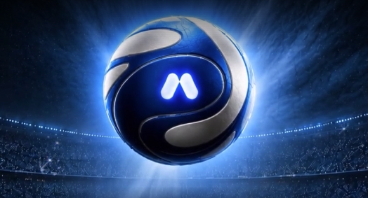 Digital artwork of the SUI cryptocurrency logo—a blue and silver sphere—floating above a stadium setting with bright lighting effects.