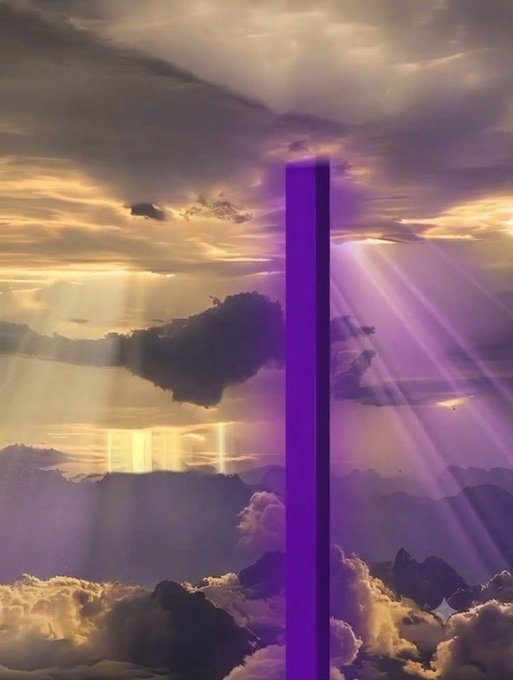 A dramatic, dreamlike sky scene featuring sun rays breaking through clouds, with a tall, glowing purple rectangular monolith positioned in the center.