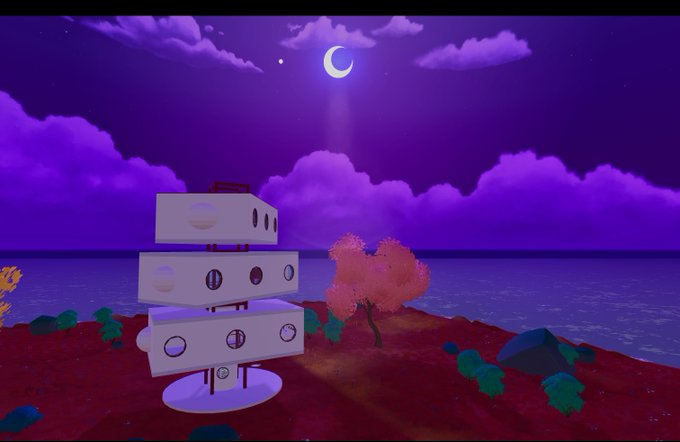 A serene nighttime scene featuring a stacked, modular white structure with circular windows standing on a reddish shore beside a calm body of water, with a crescent moon glowing in a purple sky above. The image showcases a preview of "The Pattern Studio" coming soon to Decentraland.