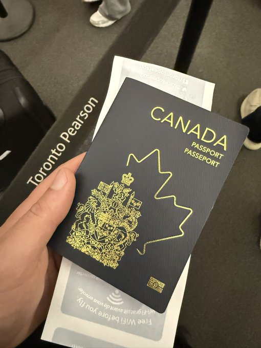 A hand holds up a Canadian passport at Toronto Pearson Airport, where visible signage reads "Toronto Pearson" and a boarding pass peeks out from behind the dark blue booklet. The image plays on the "top signal" joke by showing the person following through on an exit—physically leaving the market by jetting off on vacation rather than just watching it from the sidelines.