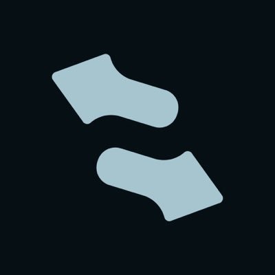 Two light blue sock-like shapes, resembling the letter "S" when viewed together, are displayed against a black background, visually representing the ticker symbol $KNOTS—referencing "STONK" spelled backward as mentioned in the post about holding $KNOTS.